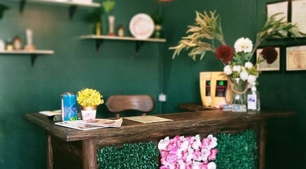 Reception area of Blue Pacific Organic Salon in Suva, Central Division, FJ, featuring floral decorations.