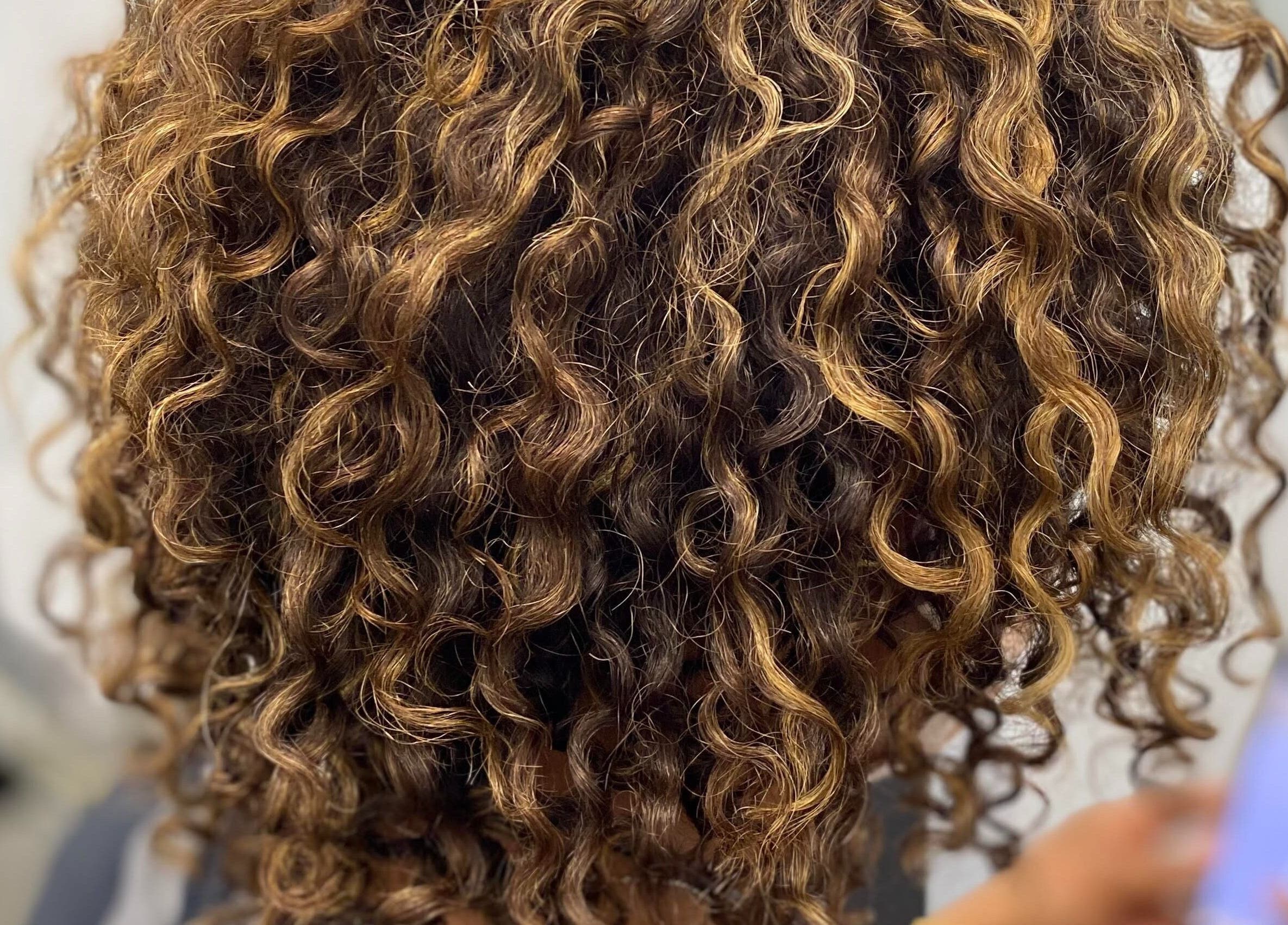 Lustrous curly hair styled at the CURL Room in Mandeville, Manchester Parish, JM.