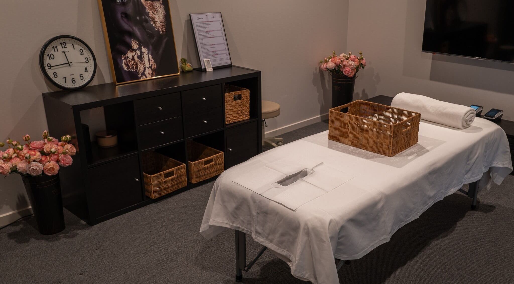Calm treatment room at Youre Soul, Thornlands, Queensland, AU with a massage table and elegant decor.