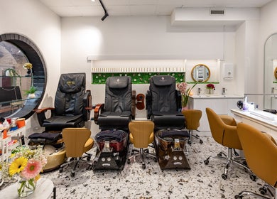 Luxurious interior of Marvellous Nail & Beauty Spa in Melbourne, Victoria, AU with plush chairs and elegant decor.