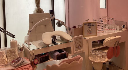 Elegant nail station at Nail Market Studio, Singapore, SG with comfy chairs and nail tools.