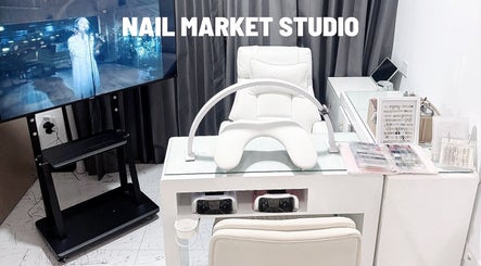 Nail Market Studio offers a sleek manicure station in Singapore, SG, featuring modern decor and tools.