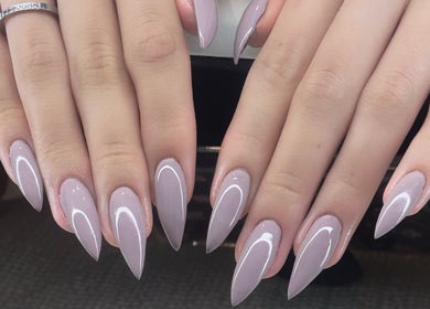 Stylish stiletto nails with pink finish at Nail Market Studio, Singapore, Singapore, SG.