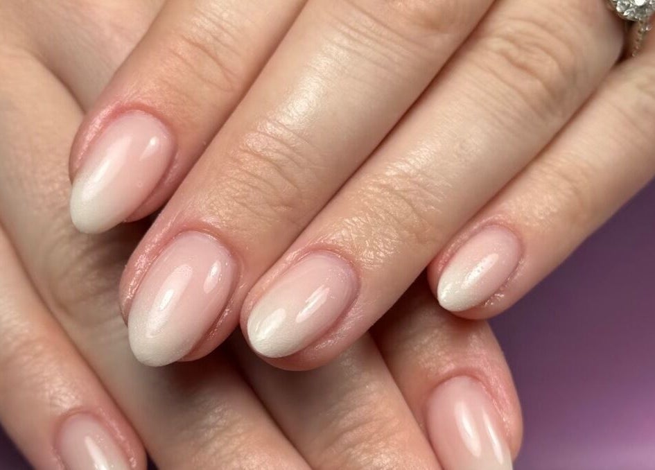 Stylish manicured nails at Ppsu Nails & Lashes Studio, Winnipeg, Manitoba, CA with a soft natural finish.