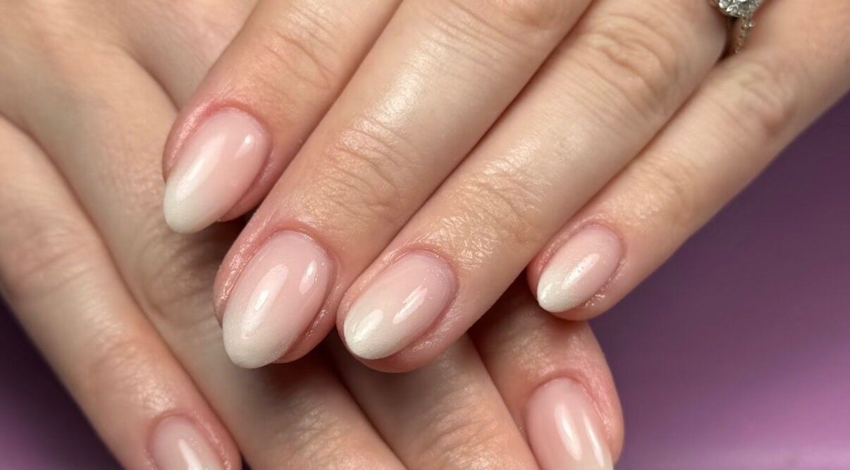 Stylish manicured nails at Ppsu Nails & Lashes Studio, Winnipeg, Manitoba, CA with a soft natural finish.