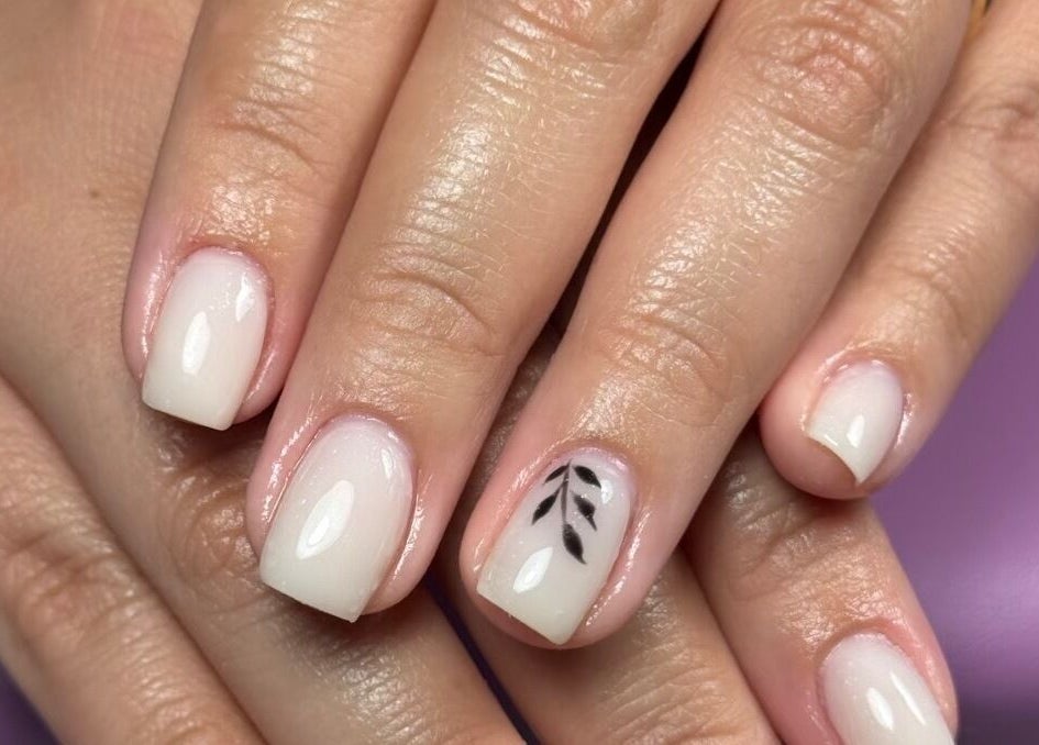 Elegant nail art with leaf design at Ppsu Nails & Lashes Studio, Winnipeg, Manitoba, CA.