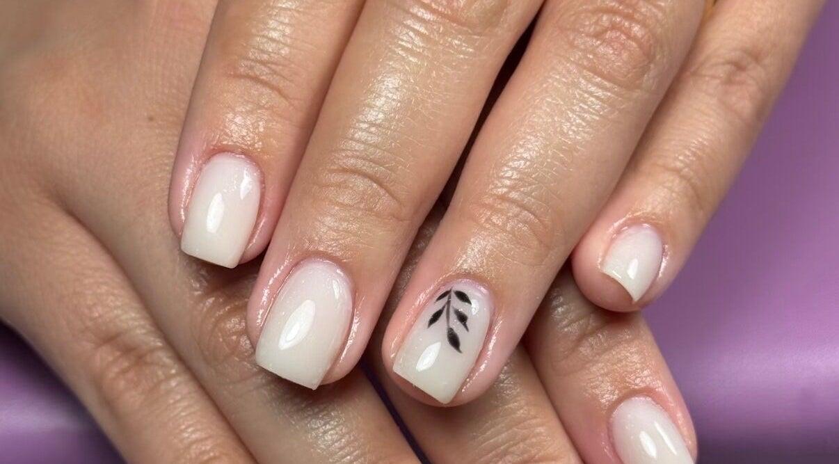 Elegant nail art with leaf design at Ppsu Nails & Lashes Studio, Winnipeg, Manitoba, CA.