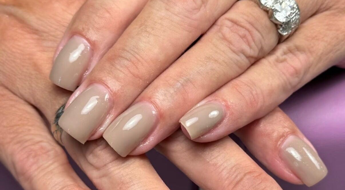 Elegant beige manicure at Ppsu Nails & Lashes Studio, Winnipeg, Manitoba, CA. Perfect for a sophisticated look.