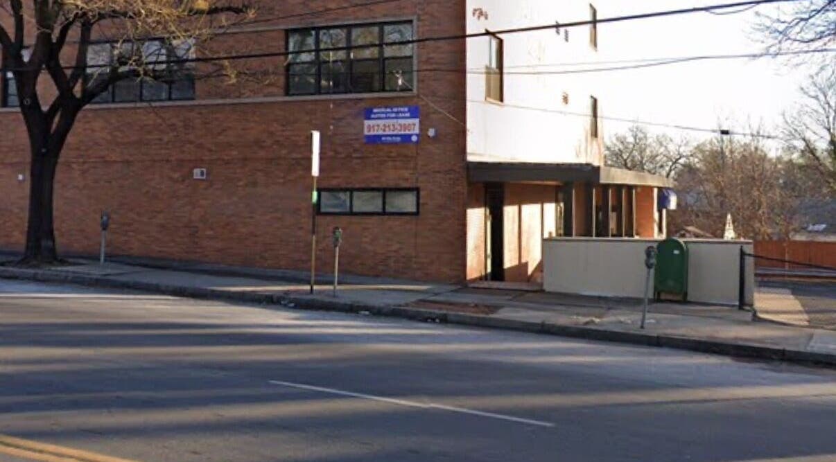 Exterior of Brows by Jisel on a sunny day in Yonkers, New York, US, showcasing a modern brick facade.