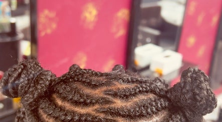 Intricate braided hairstyle at Diddy's Beauty & Wellness, London, England, GB.