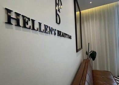 Interior of Hellens Beauty Bar in Jeddah, Makkah Province, SA with stylish seating and decor.