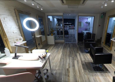 Modern, elegant interior of Eleven Eleven Salon with stylish mirrors in Stirling, Scotland, GB.
