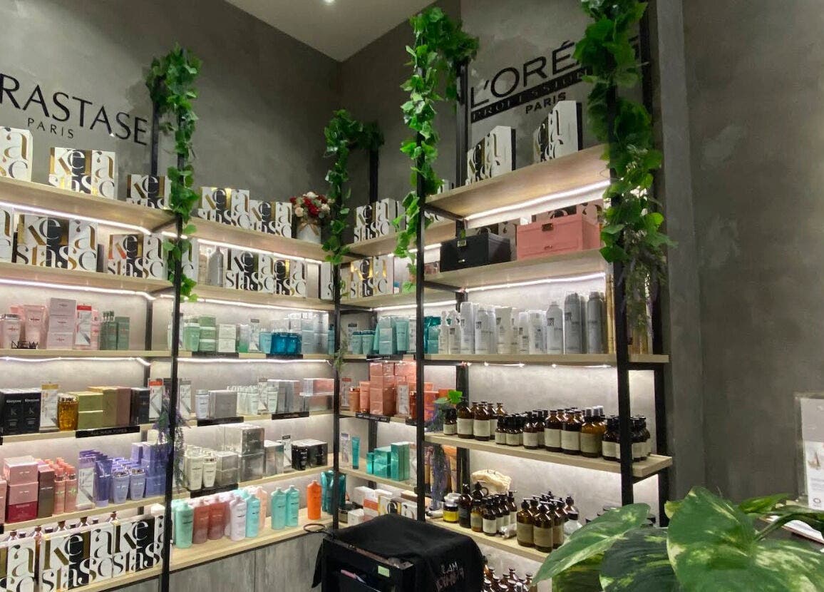 Shelves with premium hair care products at Hairover Salon (2F-45, IOI Mall Damansara), Petaling Jaya, Selangor, MY.