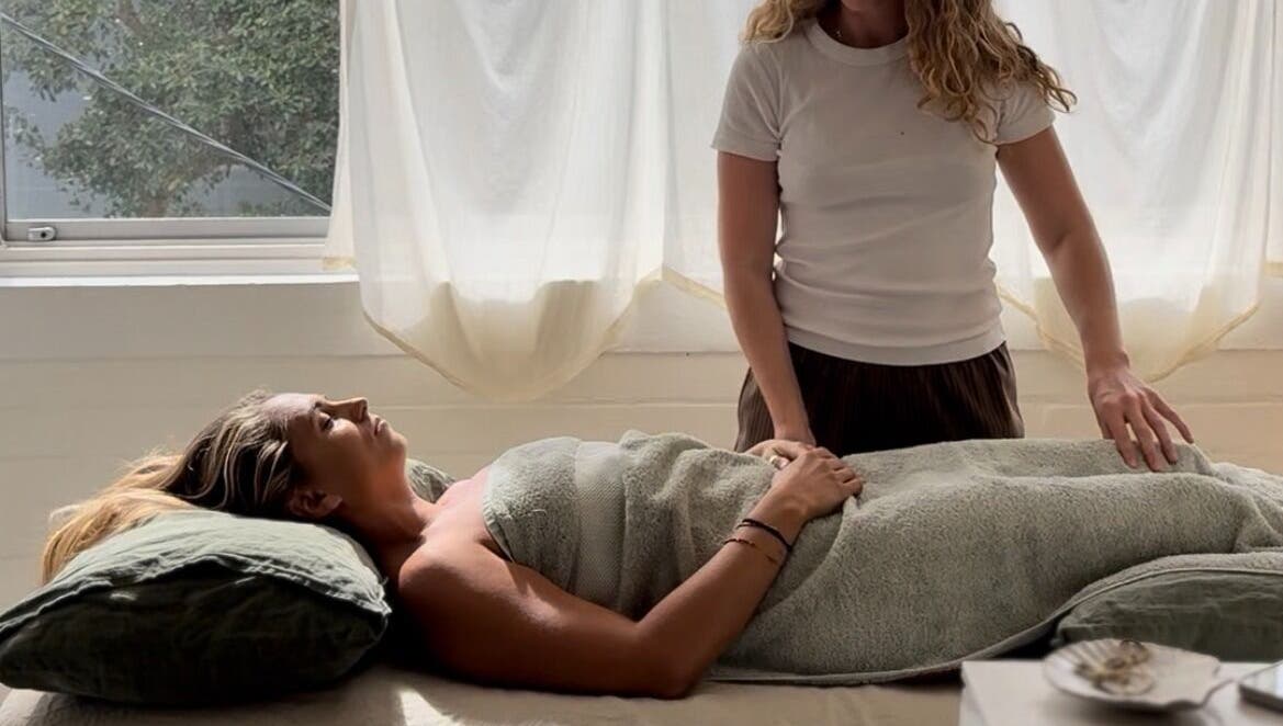 Woman receiving a calming treatment at Feeling Space - Manly, Manly, New South Wales, AU.