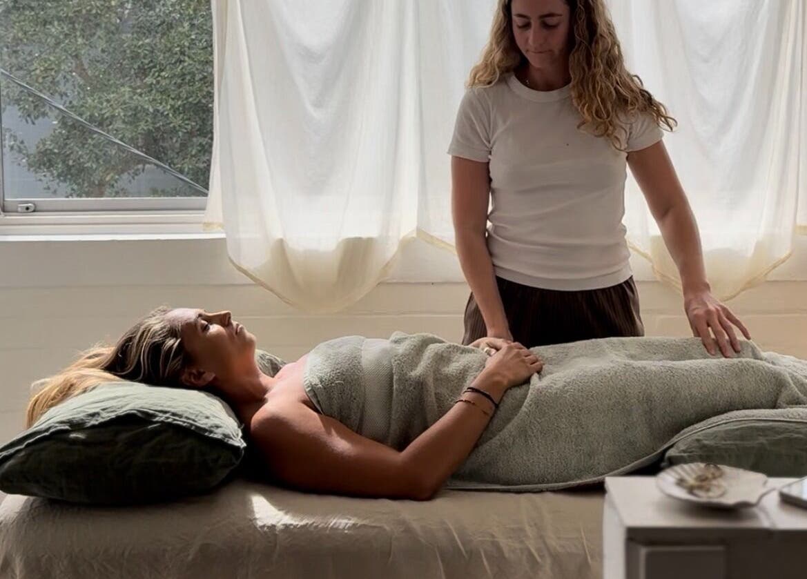 Woman receiving a calming treatment at Feeling Space - Manly, Manly, New South Wales, AU.