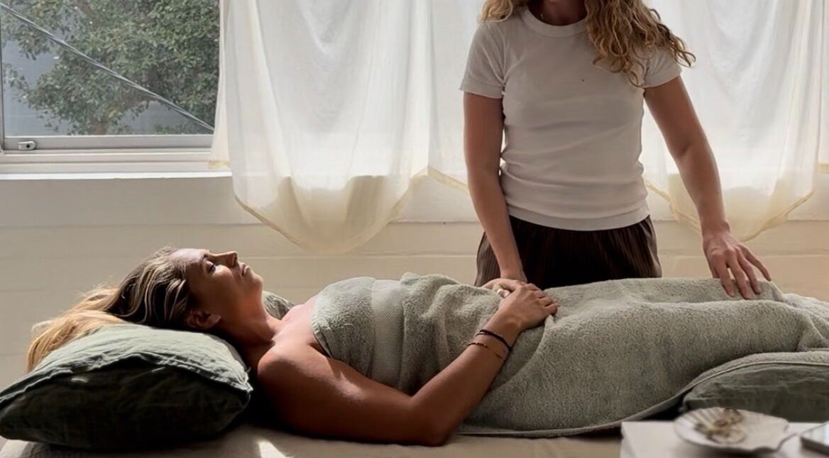 Woman receiving a calming treatment at Feeling Space - Manly, Manly, New South Wales, AU.