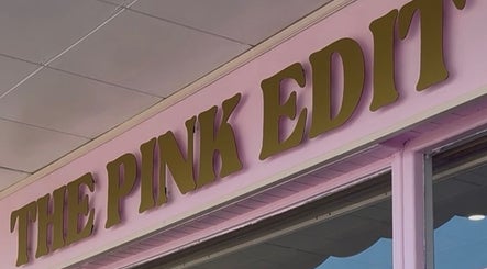 Entrance of Georgia Rose Hair Extensions adorned with pink decor, Bournemouth, England, GB.