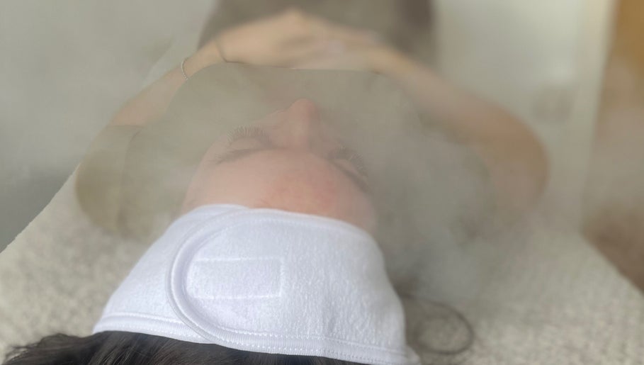 Relaxing facial steam treatment at Ell Glow in Bury, England, GB, promoting skin rejuvenation and tranquility.