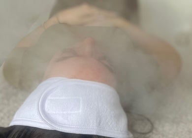 Relaxing facial steam treatment at Ell Glow in Bury, England, GB, promoting skin rejuvenation and tranquility.