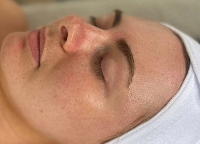 Relaxing facial treatment at Ell glow in Bury, England, GB offering rejuvenating skincare services.