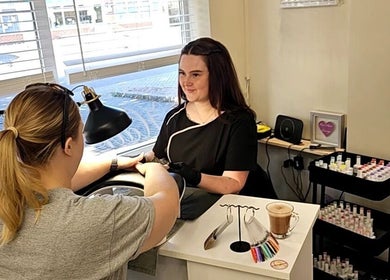 Manicure session at Our Hair Lounge in Eastleigh, England, GB. A welcoming space for beauty treatments.