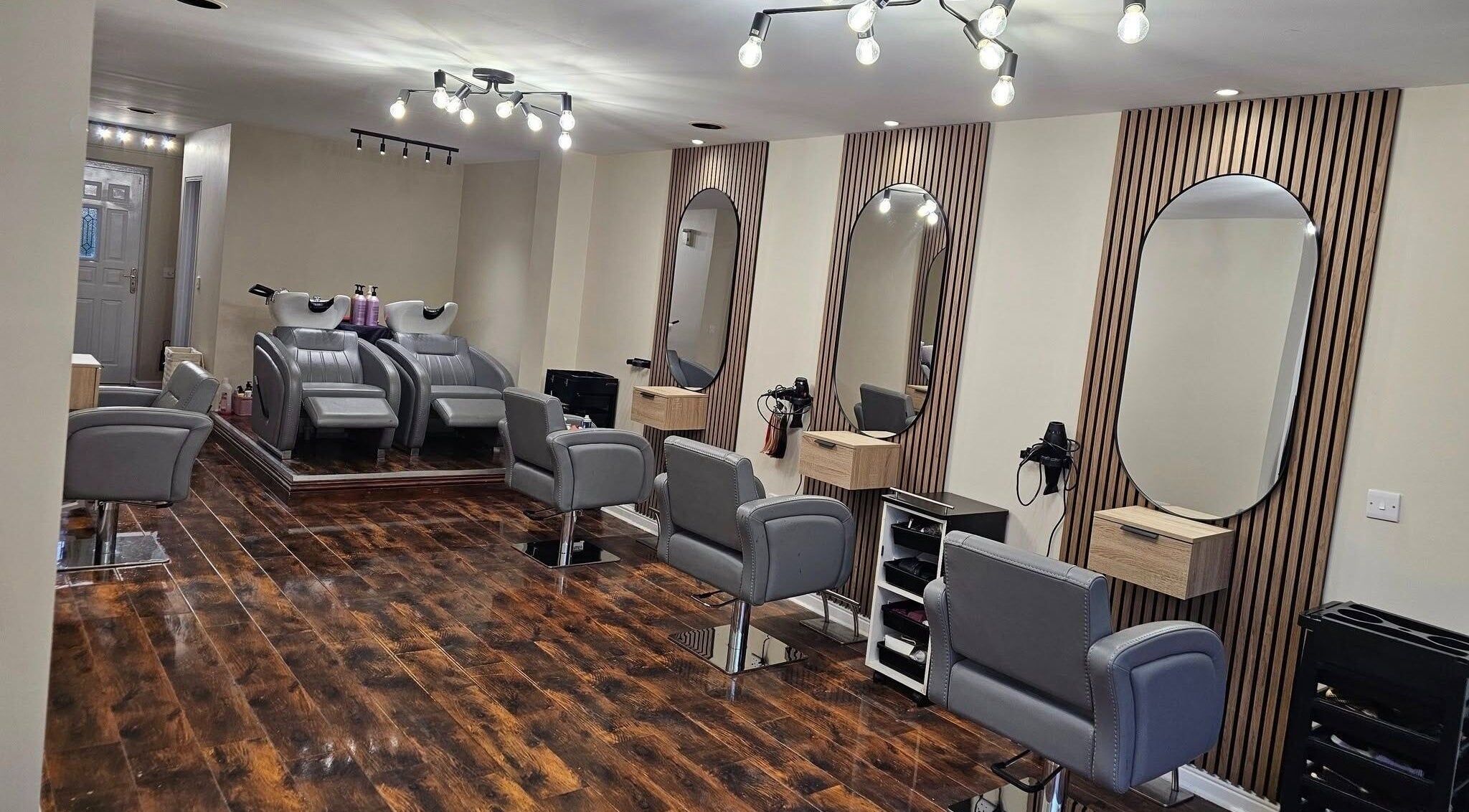Elegant interior of Our Hair Lounge in Eastleigh, England, GB with plush chairs and stylish decor.