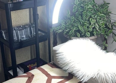 Cozy beauty setup at EyelashesByChanie, Paramaribo, Paramaribo, SR with plush decor and lash supplies.