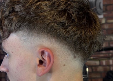 Close-up of a fresh fade haircut at The Garage Chair, Cherry Burton, England, GB, showcasing trendy barber skills.