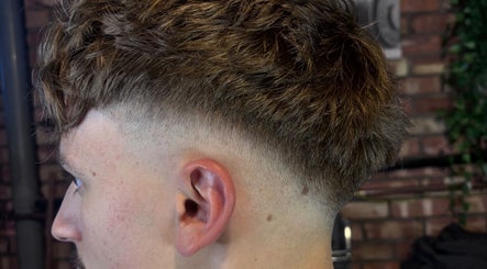 Close-up of a fresh fade haircut at The Garage Chair, Cherry Burton, England, GB, showcasing trendy barber skills.