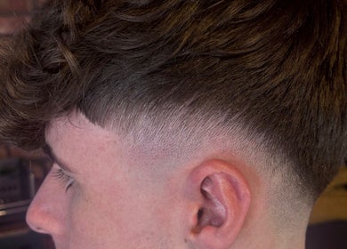 Close-up of a stylish fade haircut at The Garage Chair, Cherry Burton, England, GB.