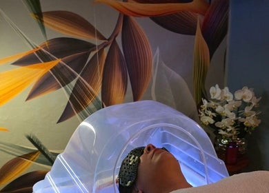 Relaxing therapy session at Revival Spa, Victoria, Beau Vallon, SC with modern decor and calming atmosphere.