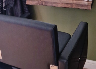 Elegant black styling chair at TasHair, Blacon, England, GB, showcasing a modern beauty salon interior.