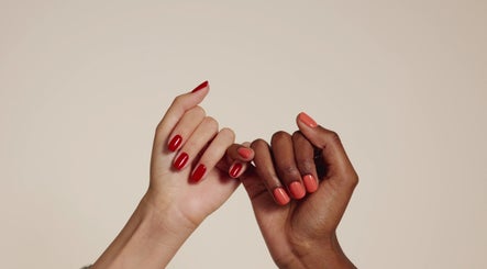 Stylish manicured hands at Bio Sculpture, London, England, GB, showcasing elegant nail art.