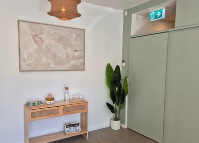 Inviting corner of Lash Mode Co. in Subiaco, Western Australia, AU with soothing decor and indoor plant.