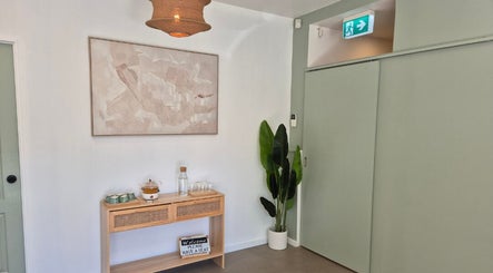 Inviting corner of Lash Mode Co. in Subiaco, Western Australia, AU with soothing decor and indoor plant.