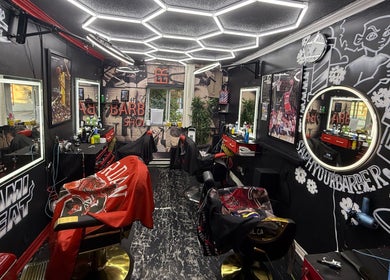 Stylish interior of Klassik Barbershop in Ottawa, Ontario, CA, showcasing vibrant decor and barber chairs.