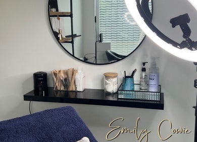 Cozy beauty setup at Emily Cowie Cosmetics, Wrentham, England, GB, featuring a ring light and mirror.