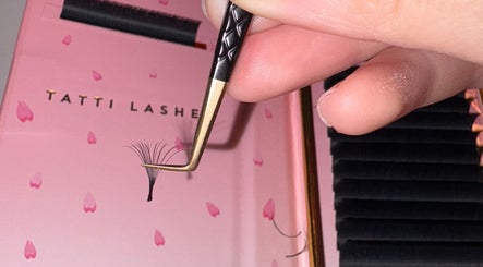 Eyelash extensions tweezed at BC Beauty Bar, Birchwood, England, GB, showcasing precision.