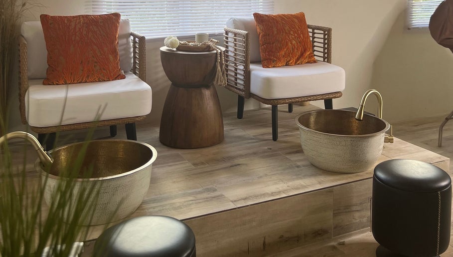 Relaxing foot spa chairs at Kali Rose Beauty, St. George’s, Saint George, AG, featuring luxurious decor.