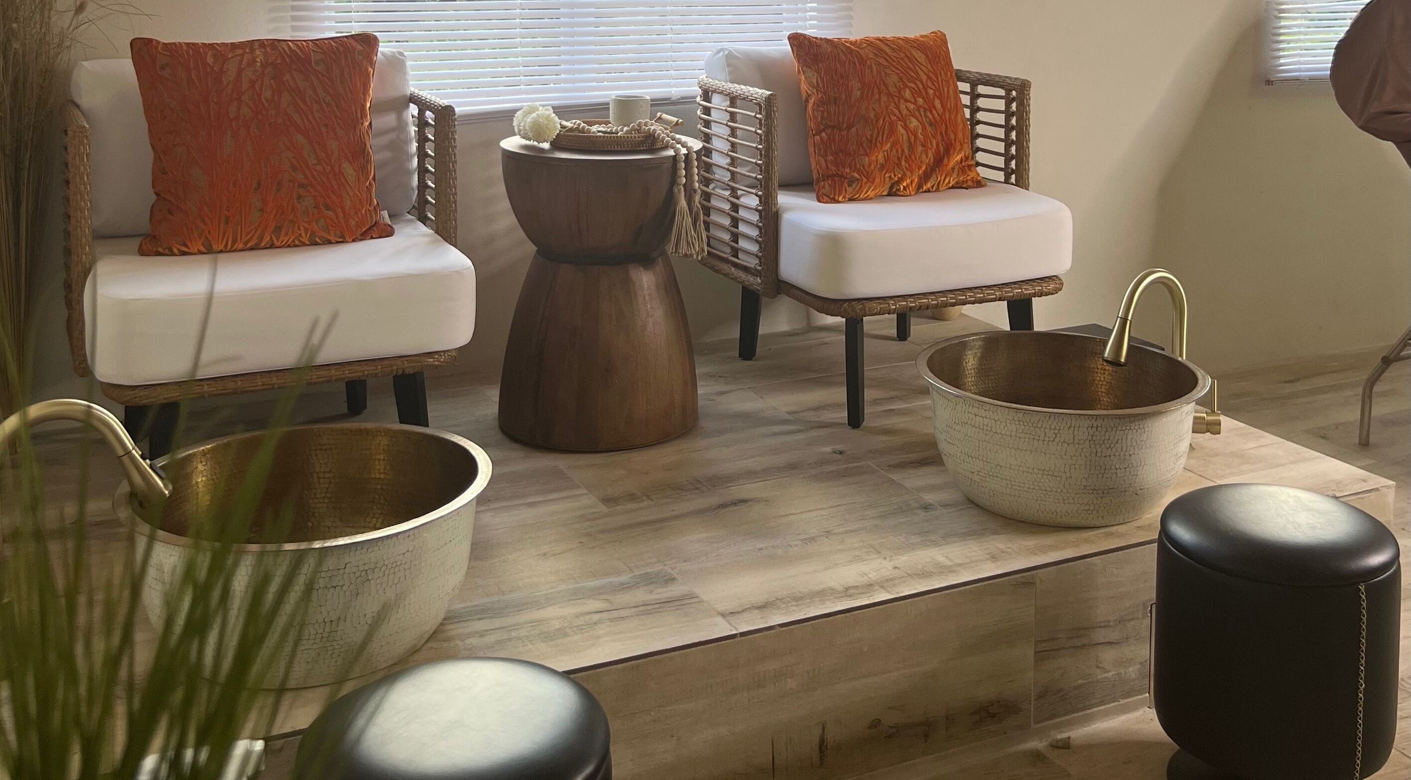 Relaxing foot spa chairs at Kali Rose Beauty, St. George’s, Saint George, AG, featuring luxurious decor.