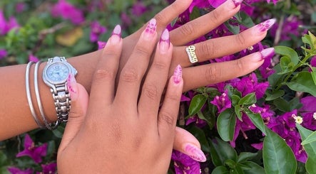 Elegant pink floral nails at Kali Rose Beauty, St. George’s, Saint George, AG. A showcase of exquisite nail artistry.