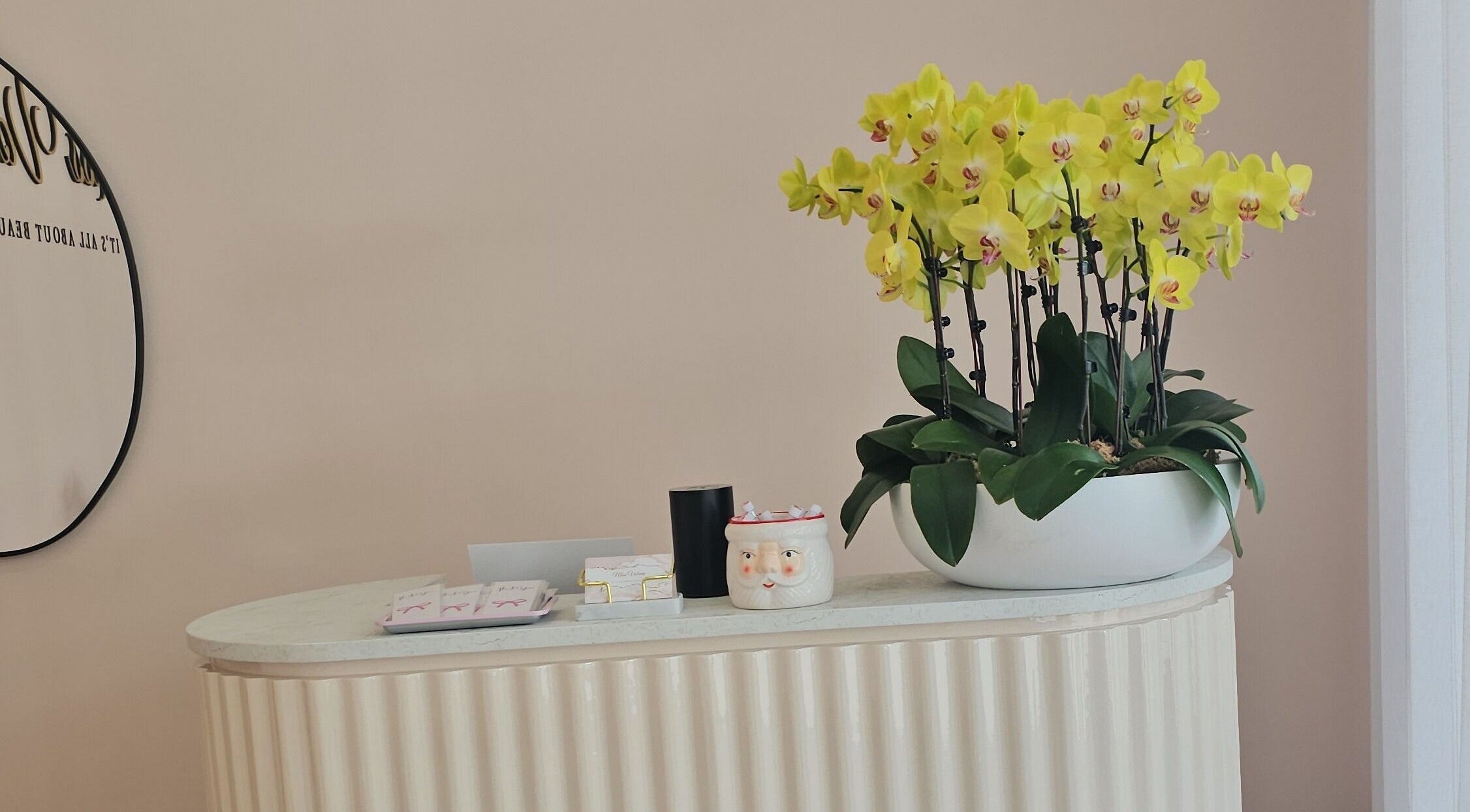 Stylish reception at Miss Volume, Rose Bay, New South Wales, AU, featuring vibrant orchids.