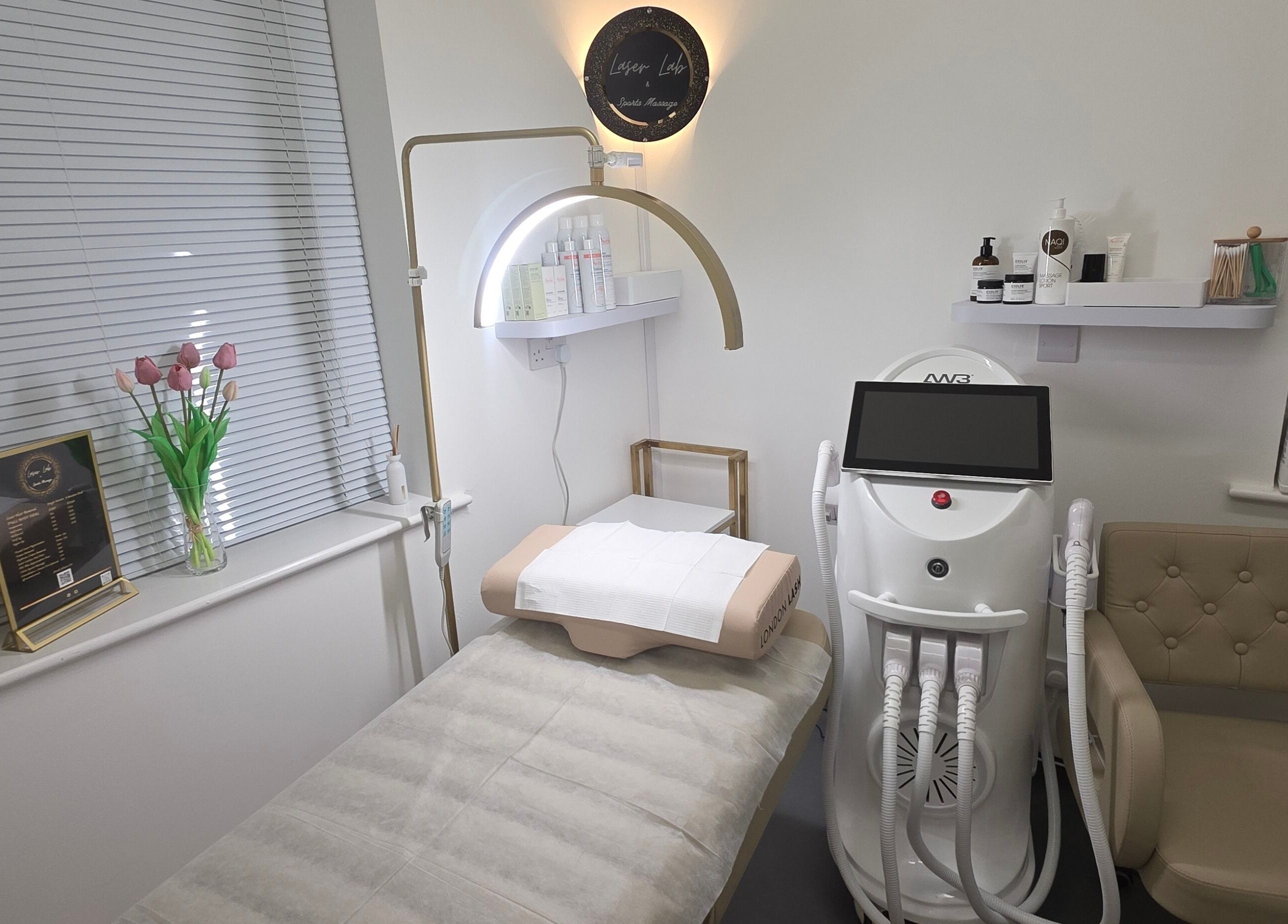 Cozy treatment area at Laser Lab & Sports Massage Clinic, Framlingham, England, GB with modern equipment.