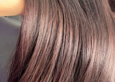 Smooth, shiny brown hair styled beautifully at SB Elite Elegance, London, England, GB.