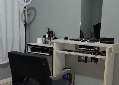 Barber chair and tools at Royal Barbershop, Pretoria, Gauteng, ZA, showcasing a professional grooming station.