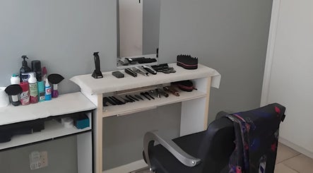 Barber station at Royal Barbershop, Pretoria, Gauteng, ZA showing tools and chair.