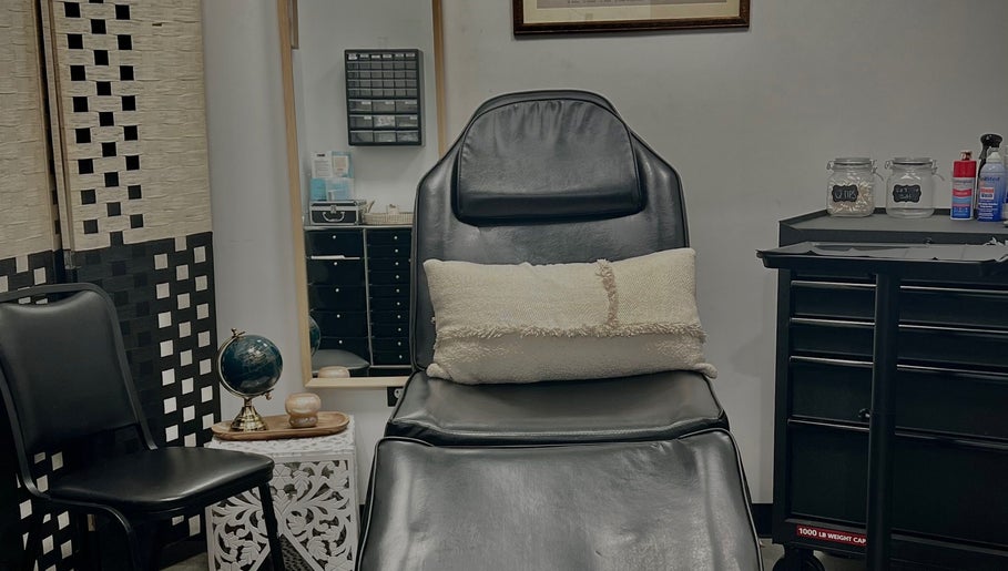 Comfortable seating at Piercings with Alina in Conroe, Texas, US, offering a relaxing experience.