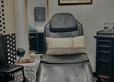 Comfortable seating at Piercings with Alina in Conroe, Texas, US, offering a relaxing experience.