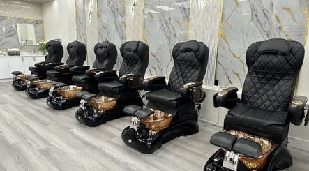 Luxurious pedicure chairs at Maison Gloss Nail Lounge in Hamilton, Ontario, CA showcase comfort and style.