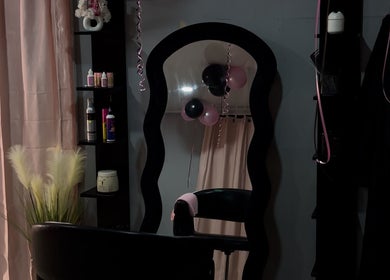 Stylish salon mirror and decor at Nyla Beauty & Fashion in Paramaribo, Paramaribo, SR enhancing the beauty ambiance.